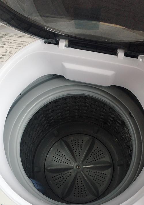 奥克斯洗衣机E12故障处理方法（轻松应对E12故障）